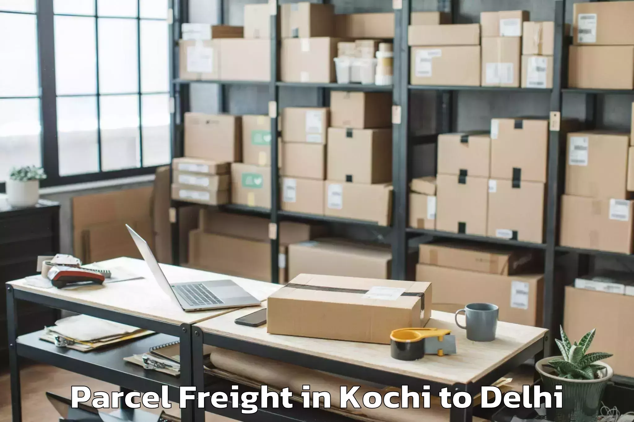 Book Kochi to Omaxe Connaught Place Parcel Freight Online